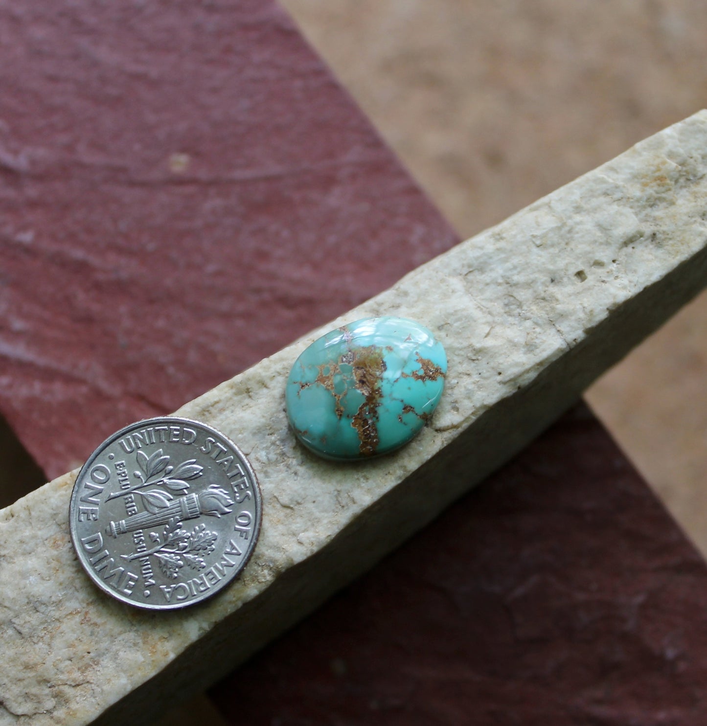 4 carat blue Harcross turquoise cabochon with red matrix