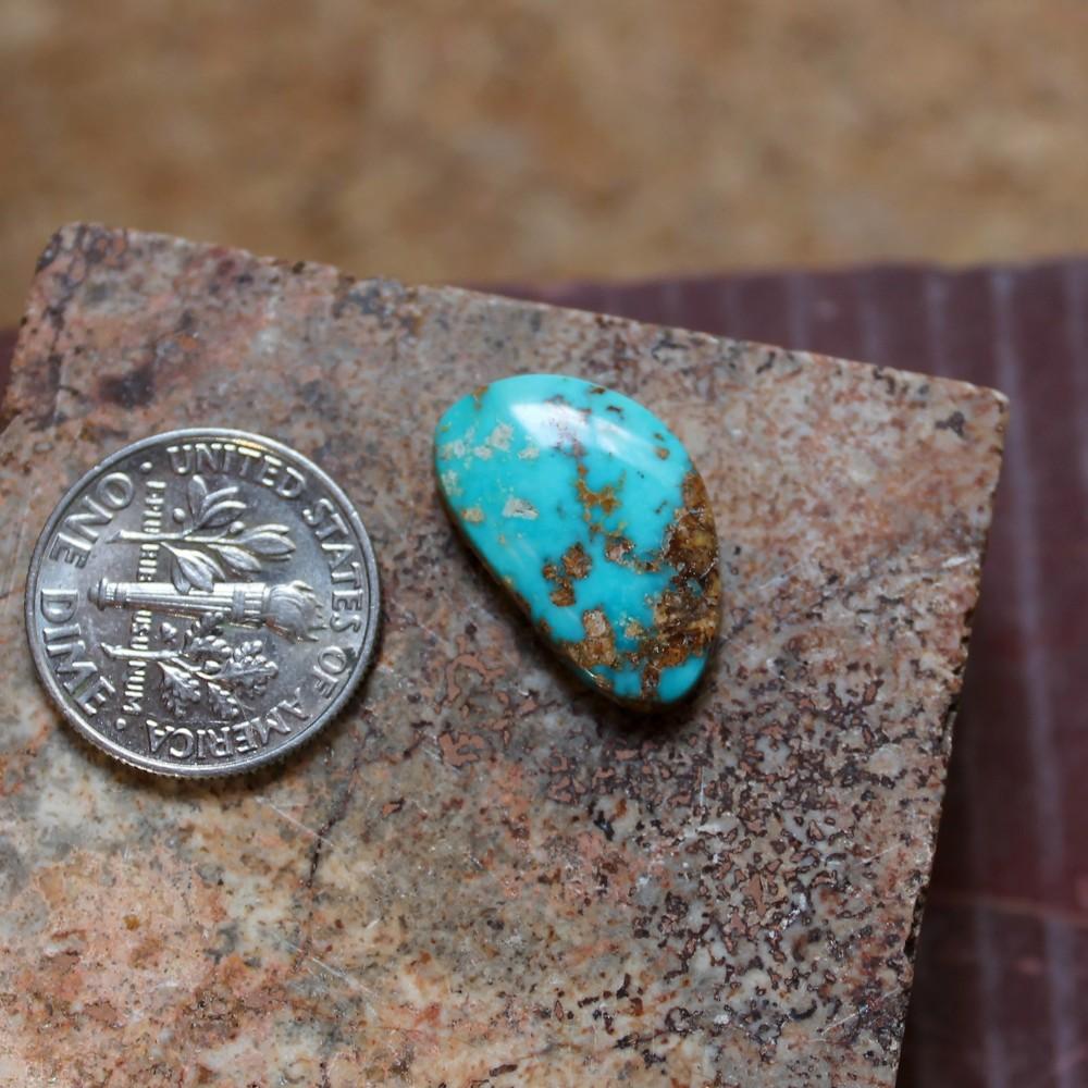 6 carat blue Stone Mountain Turquoise cabochon with red matrix - Nevada Cassidys