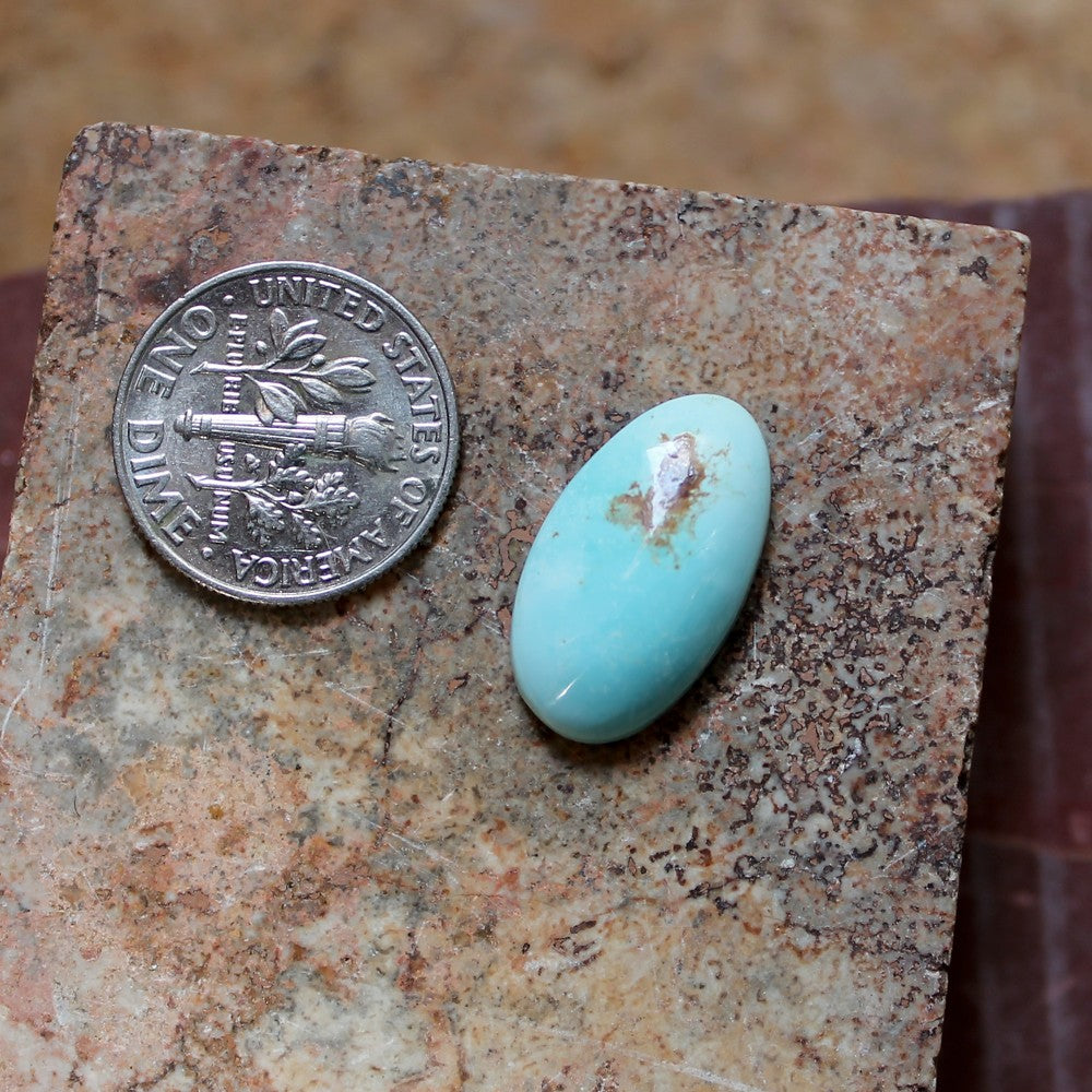 7.1 carat light blue Stone Mountain Turquoise cabochon with red matrix