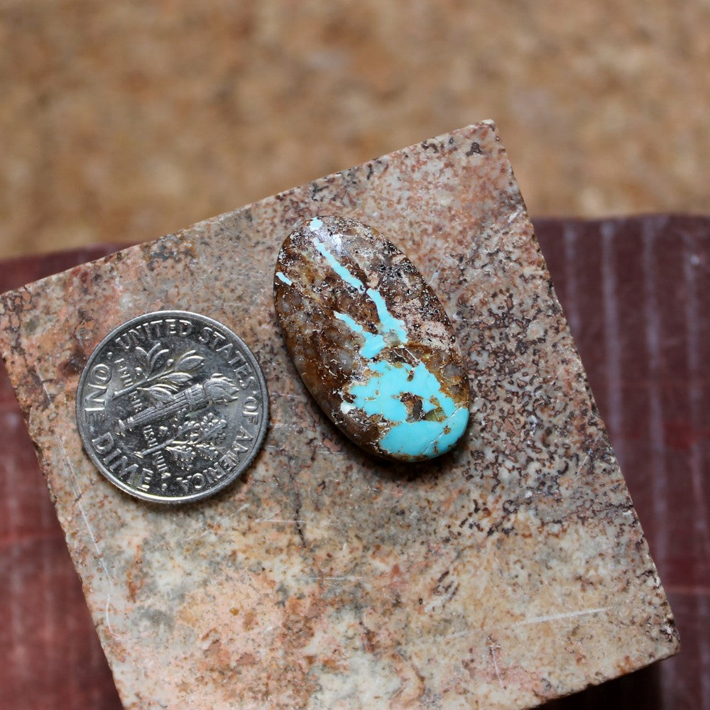 12.2 carat blue boulder Stone Mountain Turquoise cabochon with red matrix