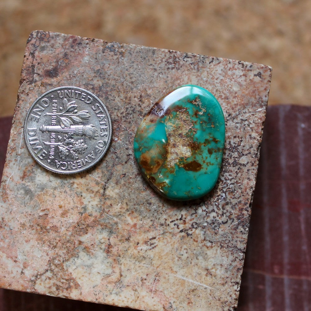 10.6 carat blue Stone Mountain Turquoise cabochon with red matrix