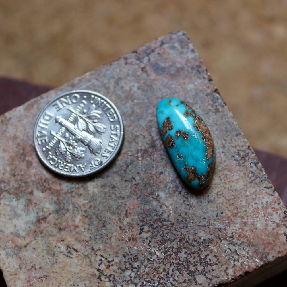 6.0 carat blue Stone Mountain Turquoise with red matrix