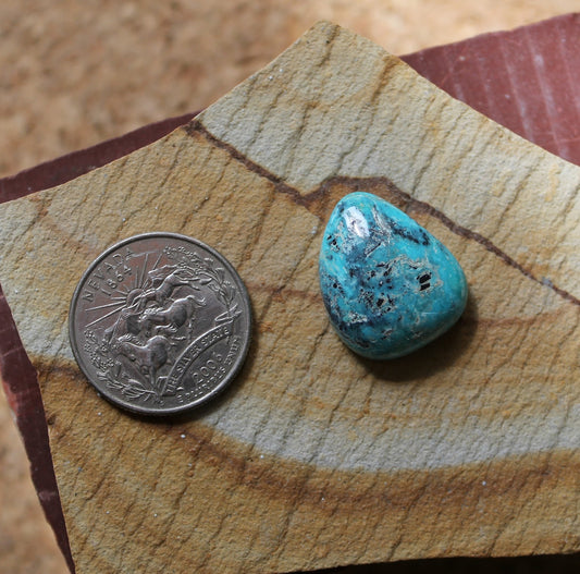 23 carat blue natural McGinnis turquoise cabochon with a high dome