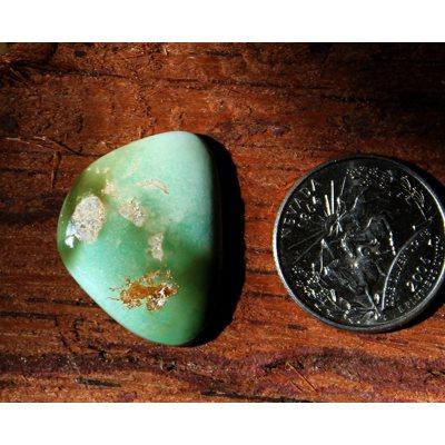 A turquoise cabochon by the Nevada Cassidys. This is a interesting variety of the turquoise found at Stone Mountain Mine that bears a signature red iron patterning.