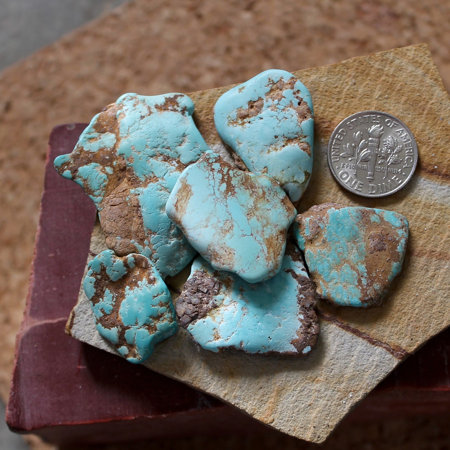 19.0 grams light blue Stone Mountain Turquoise vein segments with red matrix