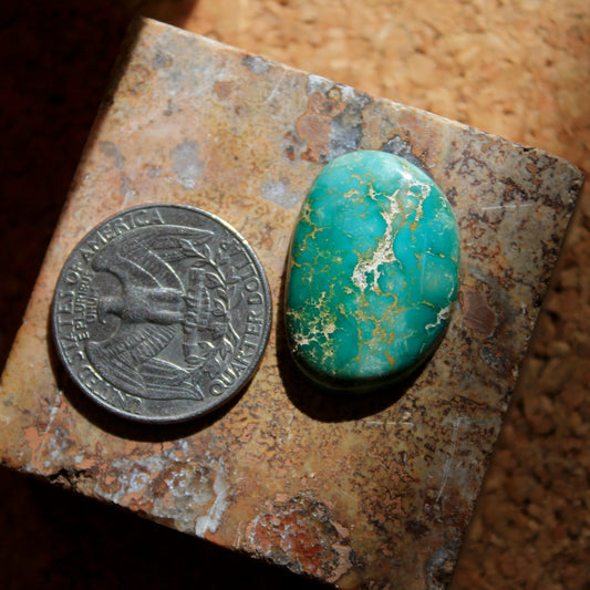 18 carat green Stone Mountain Turquoise cabochon with swirl patterning