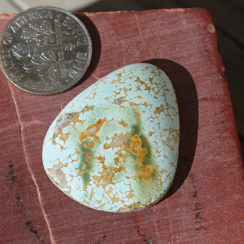 23 carats light color Stone Mountain Turquoise cabochon with rare patterning