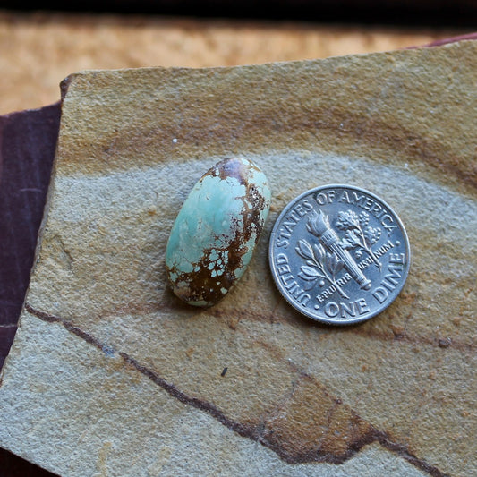 8.1 carat light blue Stone Mountain Turquoise cabochon with red matrix