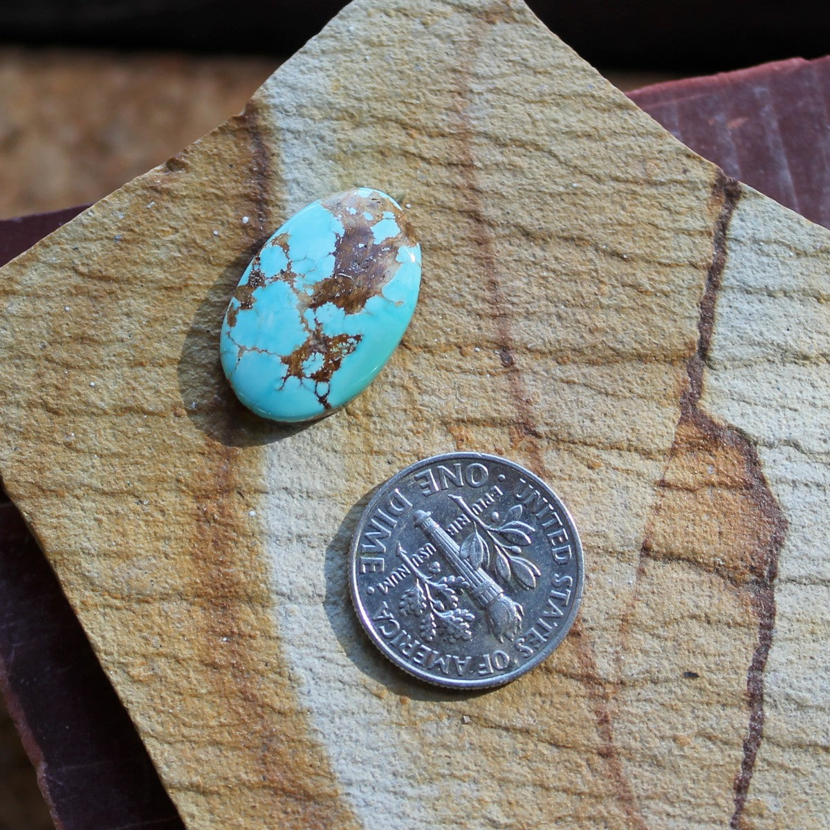 8.5 carat blue Stone Mountain Turquoise cabochon with red matrix