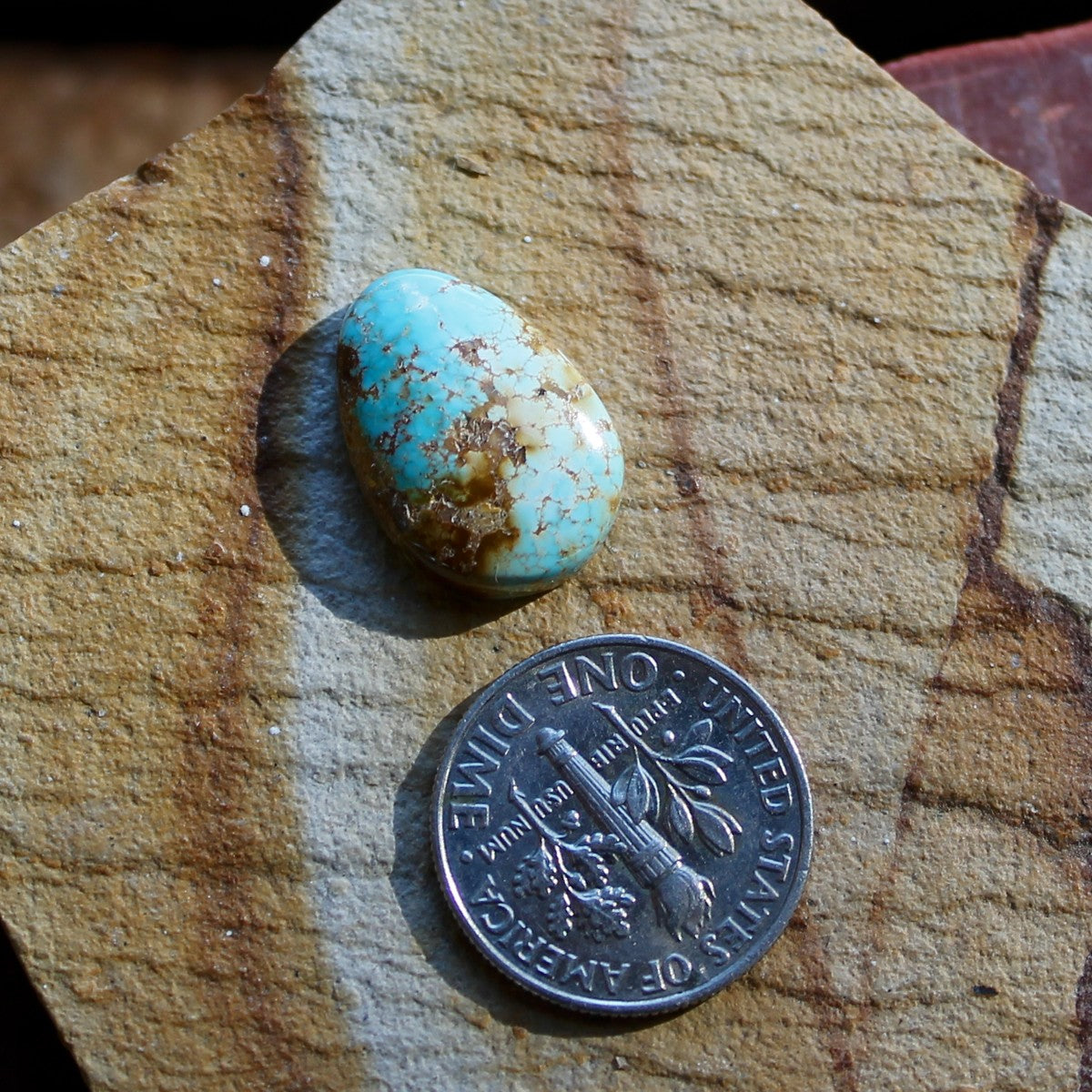 6.5 carats blue Stone Mountain Turquoise cabochon with red matrix