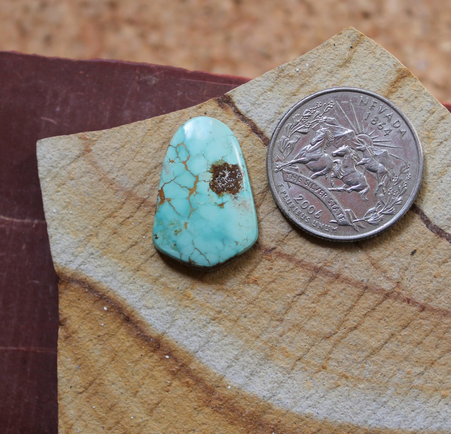 12.2 carat blue Stone Mountain Turquoise cabochon with red matrix