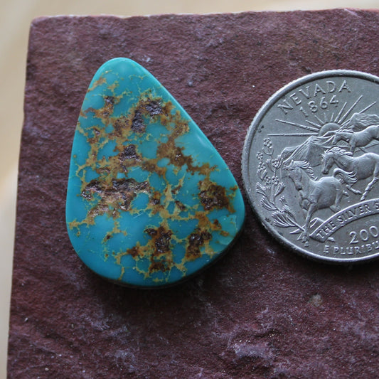 17 carat blue teal Stone Mountain Turquoise cabochon with red matrix